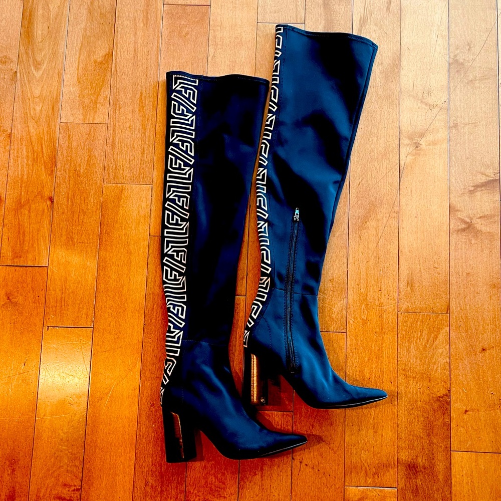 LF thigh high zip up boot.